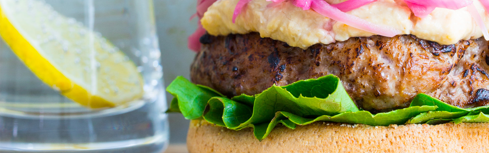Chicken Burger with Hummus and Quick Pickled Onions